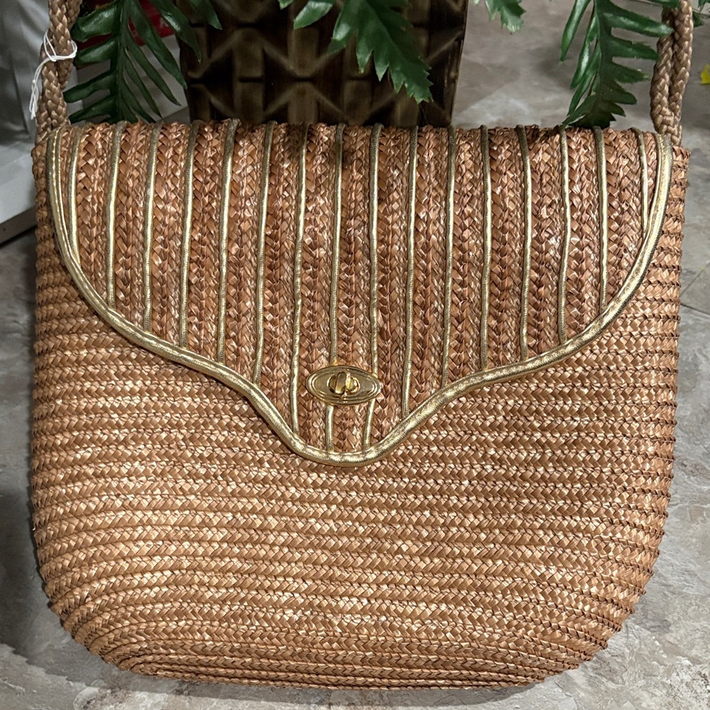 Elegant Brown Woven Bag with Gold Accents